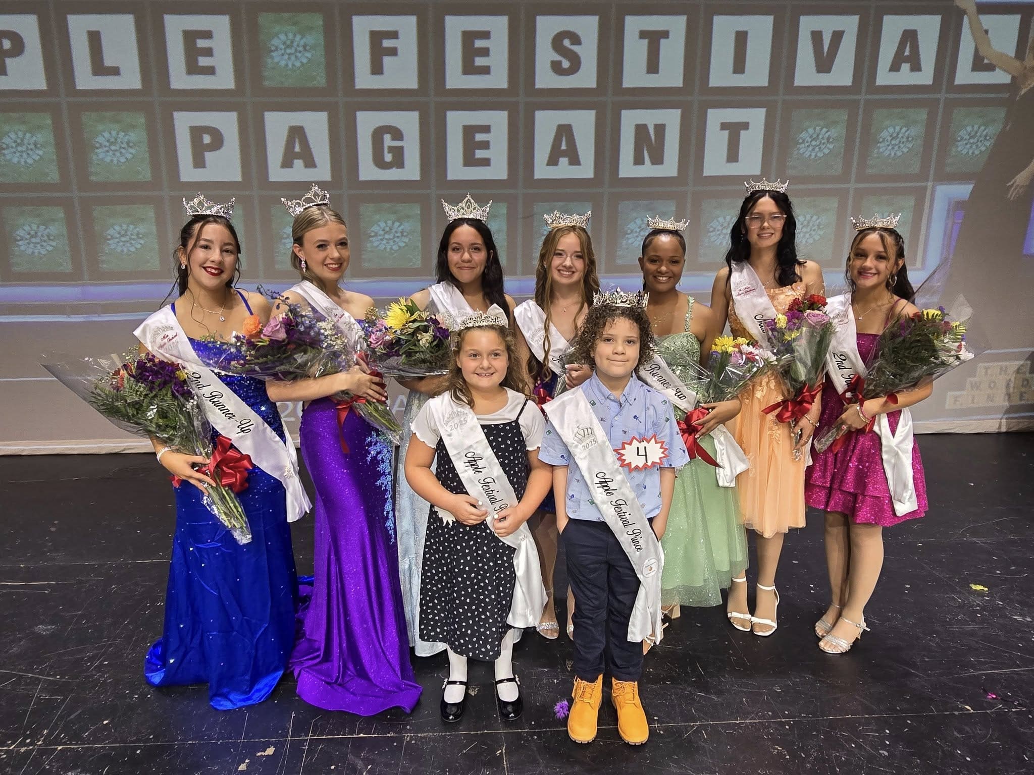 L to R front row: Maddie, Lyle L to R back row: Hailey Robbins, Mattalyn Weinberg, Deonna Cross, Allyna Vollman, Shelby Snook, Alexis McCombs.